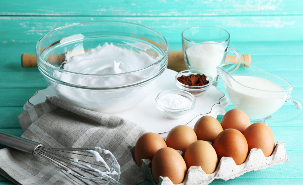 Photo of a mixing bowl with whisk for a meringues recipe using duck eggs. 