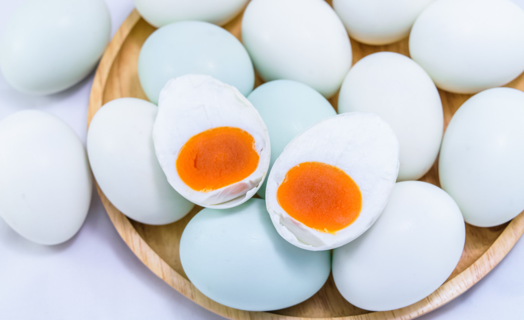 Photo of the inside of a duck egg, showing larger and richer yolks than chicken eggs.